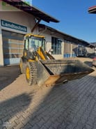 2011 JCB 409 wheel loader, front three-quarter view 2011 JCB 409 wheel loader, front three-quarter view
