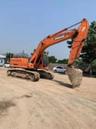 2022 Doosan DX260LC-9C excavator, side view 2022 Doosan DX260LC-9C excavator, side view