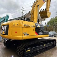 2022 Caterpillar 323DL crawler excavator, rear three-quarter view 2022 Caterpillar 323DL crawler excavator, rear three-quarter view