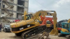 2016 Caterpillar 320C Raupenbagger, Ansicht von hinten-dreiviertel