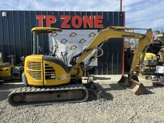 2014 Komatsu PC55MR-3 mini excavator, side view