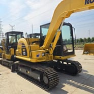 2024 Komatsu PC70-8 mini excavator, rear three-quarter view