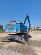 2017 Fuchs MHL320 material handler, rear three-quarter view