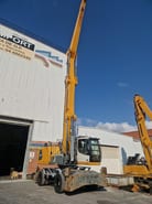 2017 Liebherr LH40 M material handler, front three-quarter view