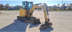 2021 Caterpillar 303.5E crawler excavator, front three-quarter view