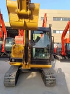 2024 Caterpillar 305.5E2 mini excavator, front view