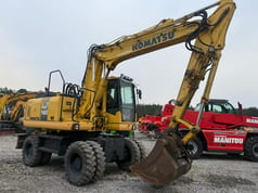 2009 Komatsu PW160-7E0 wheel excavator, side view