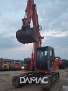 2006 Hitachi ZX130 crawler excavator, front view 2006 Hitachi ZX130 crawler excavator, front view