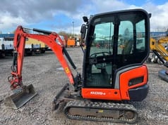 2016 Kubota KX019-4 mini excavator, side view 2016 Kubota KX019-4 mini excavator, side view