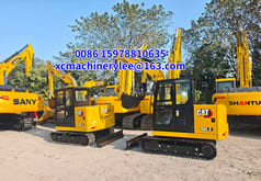 2025 Caterpillar 305.5 mini excavator, side view