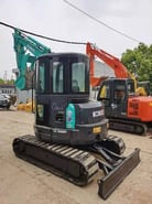 2024 Kobelco SK55SR-5 mini excavator rear three-quarter view 2024 Kobelco SK55SR-5 mini excavator rear three-quarter view