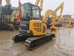 2015 Komatsu PC55MR-2 mini excavator, rear three-quarter view