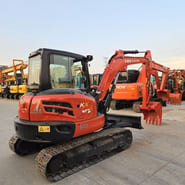 2023 Kubota KX165 mini excavator, rear three-quarter view