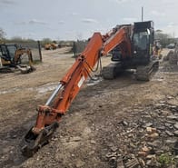 2015 Hitachi ZX130 LC N-7 crawler excavator, front three-quarter view