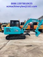 2023 Kobelco SK60 crawler excavator side view 2023 Kobelco SK60 crawler excavator side view