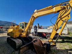 2011 Takeuchi TB175 mini excavator, rear three-quarter view