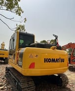 2018 Komatsu PC120-8 crawler excavator, rear three-quarter view 2018 Komatsu PC120-8 crawler excavator, rear three-quarter view