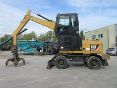 2009 Caterpillar M313D material handler, side view 2009 Caterpillar M313D material handler, side view