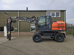 2022 Atlas 150W wheel excavator, side profile view 2022 Atlas 150W wheel excavator, side profile view