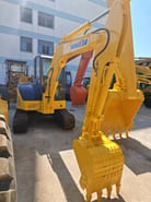 2018 Komatsu PC-55MR mini excavator, front three-quarter view