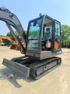 2026 Doosan DX60D mini excavator, side view
