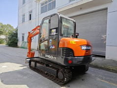 Doosan DH60-7 mini excavator, rear three-quarter view