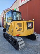 2019 Caterpillar 308 mini excavator, rear three-quarter view