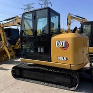 2023 Caterpillar 305.5 mini excavator, rear three-quarter view 2023 Caterpillar 305.5 mini excavator, rear three-quarter view