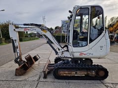 2011 Wacker Neuson 2404RD mini excavator, side view