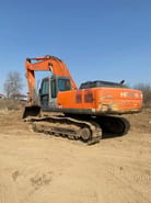 2022 Hitachi ZX330-3G excavator, rear three-quarter view 2022 Hitachi ZX330-3G excavator, rear three-quarter view
