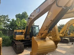 2022 Caterpillar 330GC crawler excavator, side view