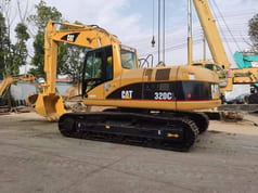 2008 Caterpillar 320CL crawler excavator, side profile view 2008 Caterpillar 320CL crawler excavator, side profile view