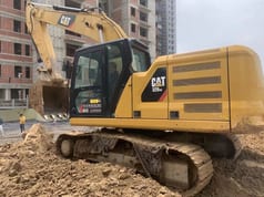 2023 Caterpillar 320GC crawler excavator side view