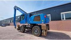 2017 Liebherr LH50M material handler, rear three-quarter view