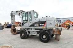 2009 Caterpillar M313D wheel excavator, side view