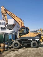2021 Hyundai R210W-9T wheel excavator, side profile view