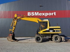 1996 Caterpillar M315 wheel excavator, side profile view 1996 Caterpillar M315 wheel excavator, side profile view