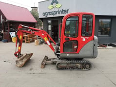 2011 Bobcat E14 mini excavator, side view