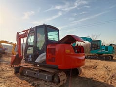 Hitachi ZX60 mini excavator, rear three-quarter view Hitachi ZX60 mini excavator, rear three-quarter view