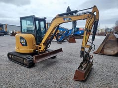 2012 Caterpillar 304E mini excavator, side view