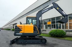 2026 Hyundai HX60G mini excavator, side view