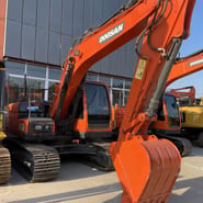 Doosan DX140LC-9C crawler excavator, front three-quarter view