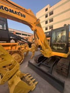 2019 Komatsu PC58-8 crawler excavator, front three-quarter view 2019 Komatsu PC58-8 crawler excavator, front three-quarter view
