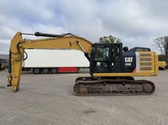 2012 Caterpillar 320E crawler excavator, side view