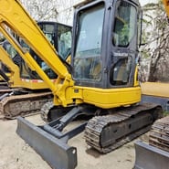 2023 Komatsu PC35MR-2 mini excavator, front three-quarter view