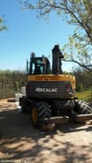 2006 Mecalac 714 MW wheel excavator, rear view 2006 Mecalac 714 MW wheel excavator, rear view