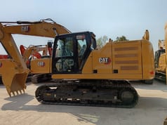 2023 Caterpillar 320GC crawler excavator side view