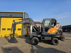 2024 Develon DX60WN ECO-1 wheel excavator side view 2024 Develon DX60WN ECO-1 wheel excavator side view