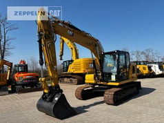 2021 Caterpillar 313-07B crawler excavator, front three-quarter view