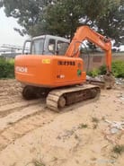 2017 Hitachi EX60 mini excavator, rear three-quarter view 2017 Hitachi EX60 mini excavator, rear three-quarter view